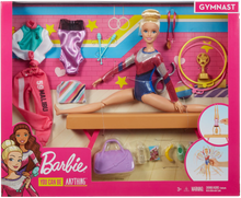 Load image into Gallery viewer, Barbie! You can be ANYTHING! with this set you can be a gymnast! Barbie can tumble, twist and turn with the balance beam and 15 + accessories, pretend you have won the Olympics and win trophies and medals, all included in the Barbie Gymnast set.  Barbie is wearing a colourful metallic leotard and she can do an outfit change with the extra outfits included with the se
