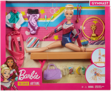 Load image into Gallery viewer, Barbie! You can be ANYTHING! with this set you can be a gymnast! Barbie can tumble, twist and turn with the balance beam and 15 + accessories, pretend you have won the Olympics and win trophies and medals, all included in the Barbie Gymnast set.  Barbie is wearing a colourful metallic leotard and she can do an outfit change with the extra outfits included with the se