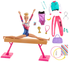 Load image into Gallery viewer, Barbie! You can be ANYTHING! with this set you can be a gymnast! Barbie can tumble, twist and turn with the balance beam and 15 + accessories, pretend you have won the Olympics and win trophies and medals, all included in the Barbie Gymnast set.  Barbie is wearing a colourful metallic leotard and she can do an outfit change with the extra outfits included with the se
