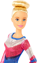 Load image into Gallery viewer, Barbie! You can be ANYTHING! with this set you can be a gymnast! Barbie can tumble, twist and turn with the balance beam and 15 + accessories, pretend you have won the Olympics and win trophies and medals, all included in the Barbie Gymnast set.  Barbie is wearing a colourful metallic leotard and she can do an outfit change with the extra outfits included with the se