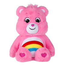 Load image into Gallery viewer, Cheer Bear is a very happy, bright pink care bear who helps others see the bright side of life.  She will sometimes even do a cheer to help make someone happier! Each bear comes with a specail care coin to collect & share! Each coin includes a way to share your care by showing others how much you care out loud! Say! Show it! Share it!