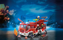 Load image into Gallery viewer, The Playmobil 9464 City Action Fire Engine is ready for any emergency call.  The vehicle features lights and siren sounds for realistic play as well as a removable roof for easier access to the interior.