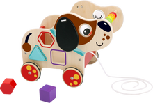Load image into Gallery viewer, This adorable wooden pull along dog, will give your child hours of fun, this wonderful floopy eared friend is more than just a toy, your child can learn all about colours and shapes through play, this pup will keep your child entertained and educated.
