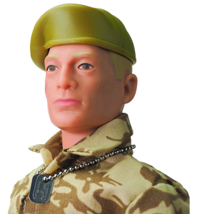 Action Man retro, movable soldier from Hasbro with many distinctive features, such as the scar on his cheek, identification tag/dog tag, military camouflaged uniform, boots and beret.  Close up of head.