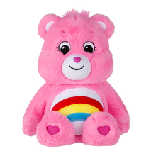 Load image into Gallery viewer, Cheer Bear is a very happy, bright pink care bear who helps others see the bright side of life.  She will sometimes even do a cheer to help make someone happier! Each bear comes with a specail care coin to collect &amp; share! Each coin includes a way to share your care by showing others how much you care out loud! Say! Show it! Share it!
