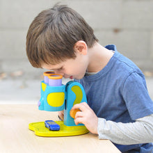 Load image into Gallery viewer, Does your child love science? Explore your world with My First Microscope.  Ignite the spark in every child! There is a light inside all of us that shines brightest when we are playing.  Specimin tray holds flat and 3D objects so your child can investigate all kinds of wonderful objects.
