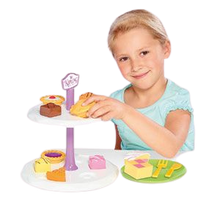 Load image into Gallery viewer, Humpty Dumpty are pleased to be offering the Mr Kipling cake stand with Tea set, this afternoon tea set includes such cakes as fondant fancy, bakewell tart, battenberg, jam tart and apple pie, your little ones can learn through role play by making teatime fun with shape sorting, little girl enjoying playing
