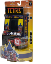 Load image into Gallery viewer, Everybody loves the classic game of Tetris, you can now play this fantastic arcade game in miniature, get ready to be addicted to dropping tetriminos into the slots, by rotating the different shapes.
